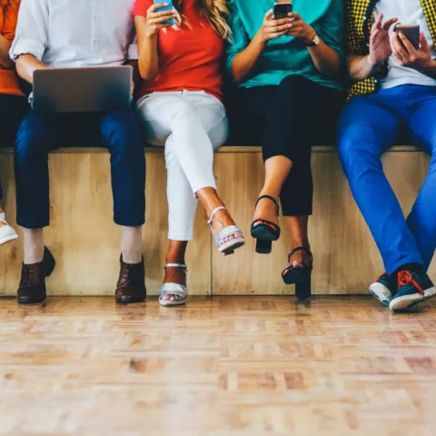 people sitting on bench