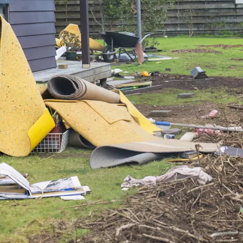 Carpet removed from water damaged house. Cleaning up after flooding.