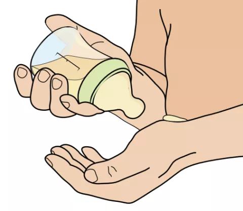 An illustration depicting a person testing the temperature of a bottle of formula on their left wrist.