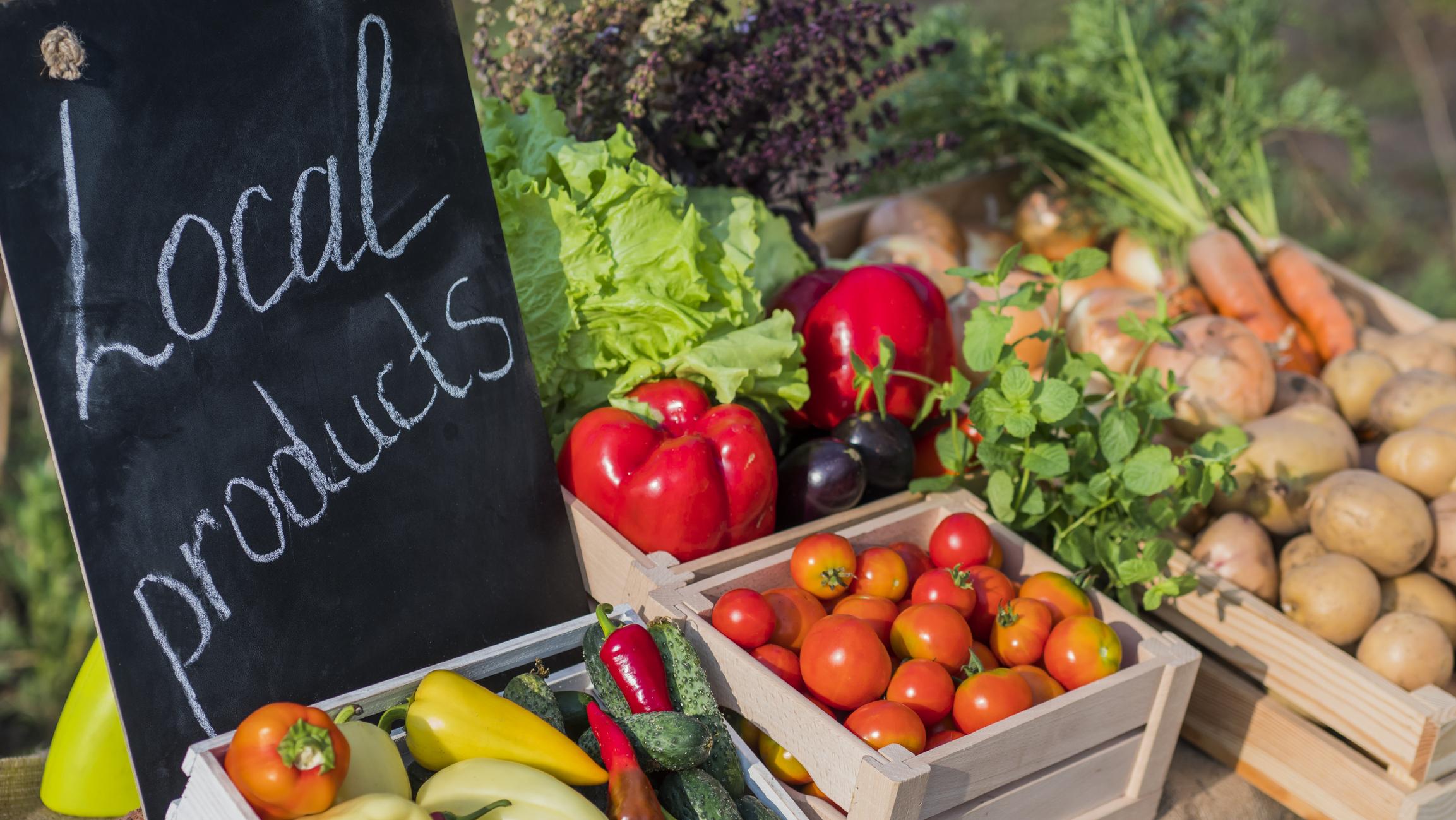 fresh produce at a farmers market table