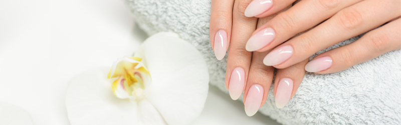 Manicured nails on a towel