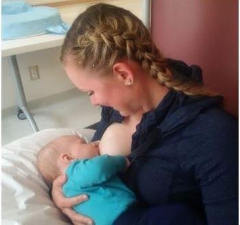 Woman breastfeeding baby