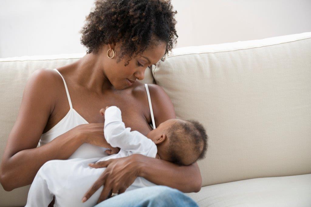 Woman breastfeeding baby