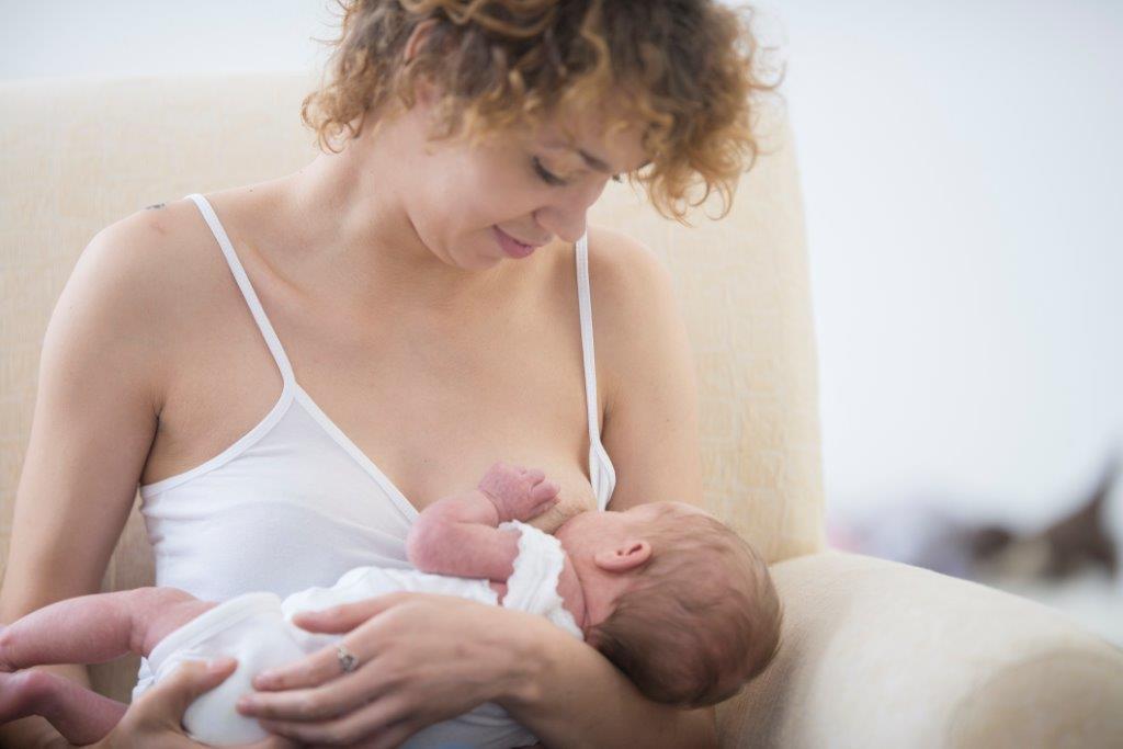 Woman breastfeeding baby