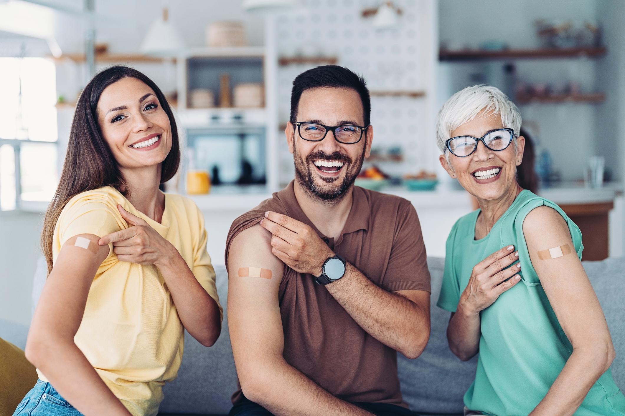 Group of smiling people got vaccinated