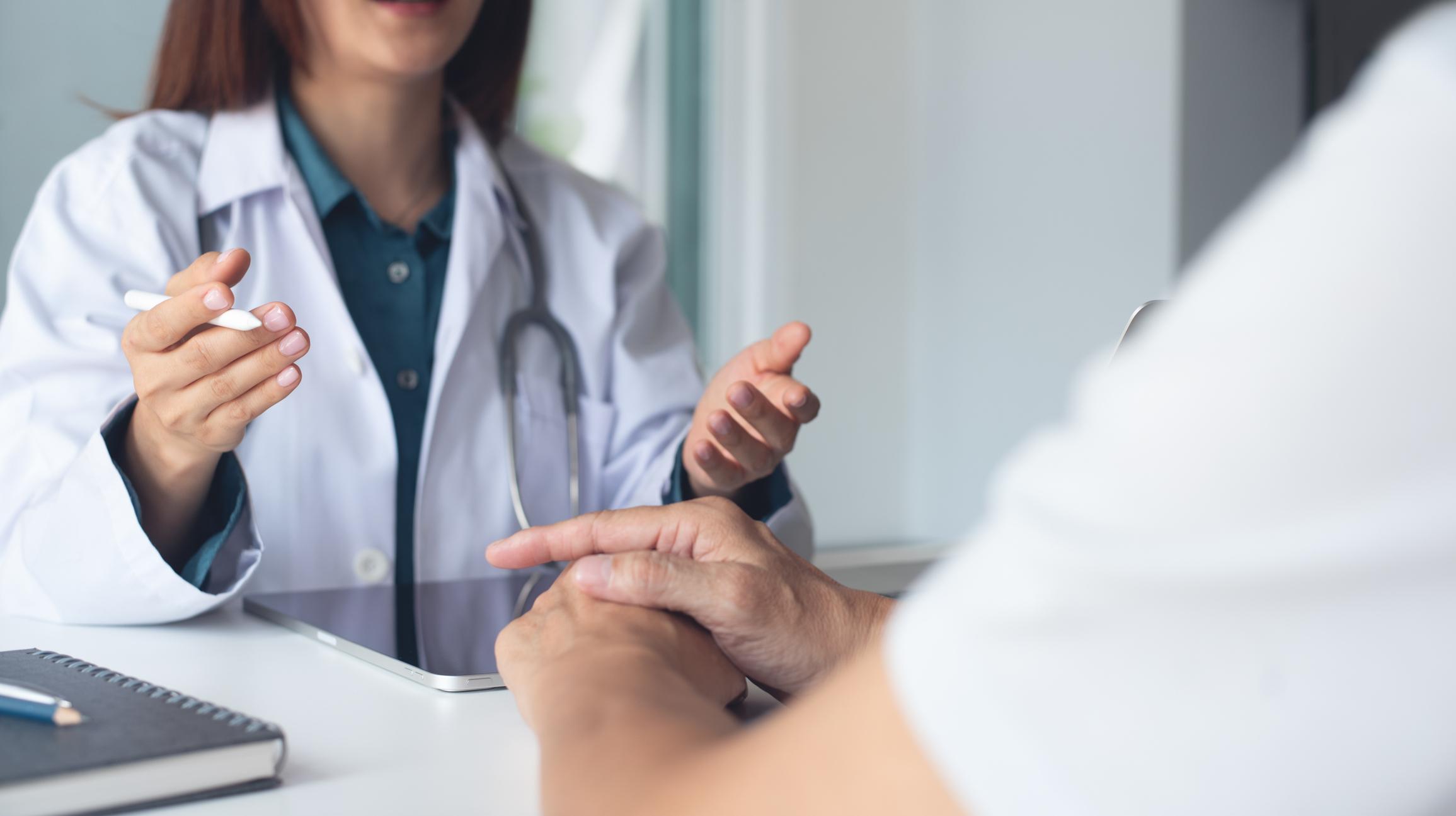 Doctor consulting with patient