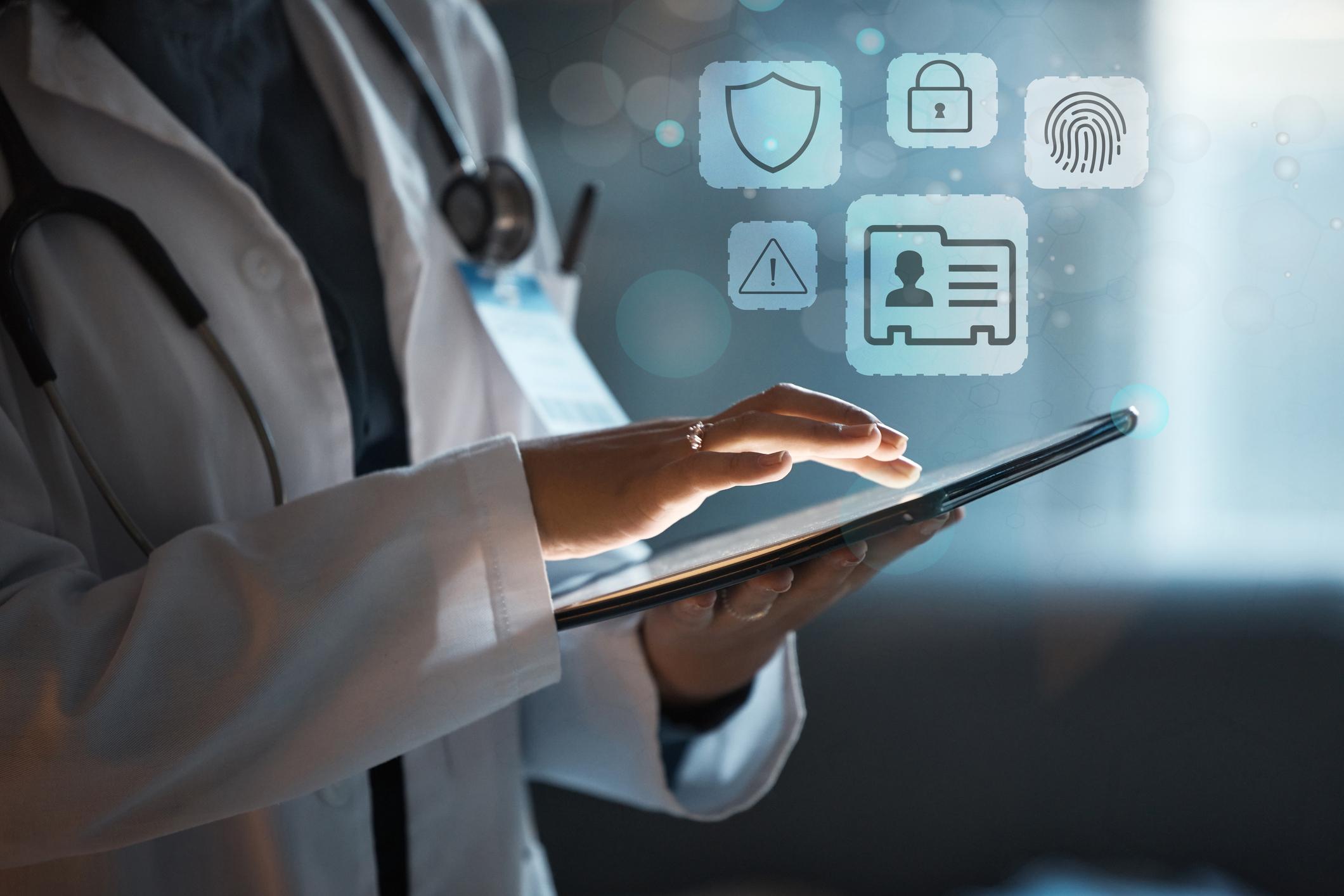 Tablet, overlay and hands of doctor with safety icon, privacy and cybersecurity in healthcare network.