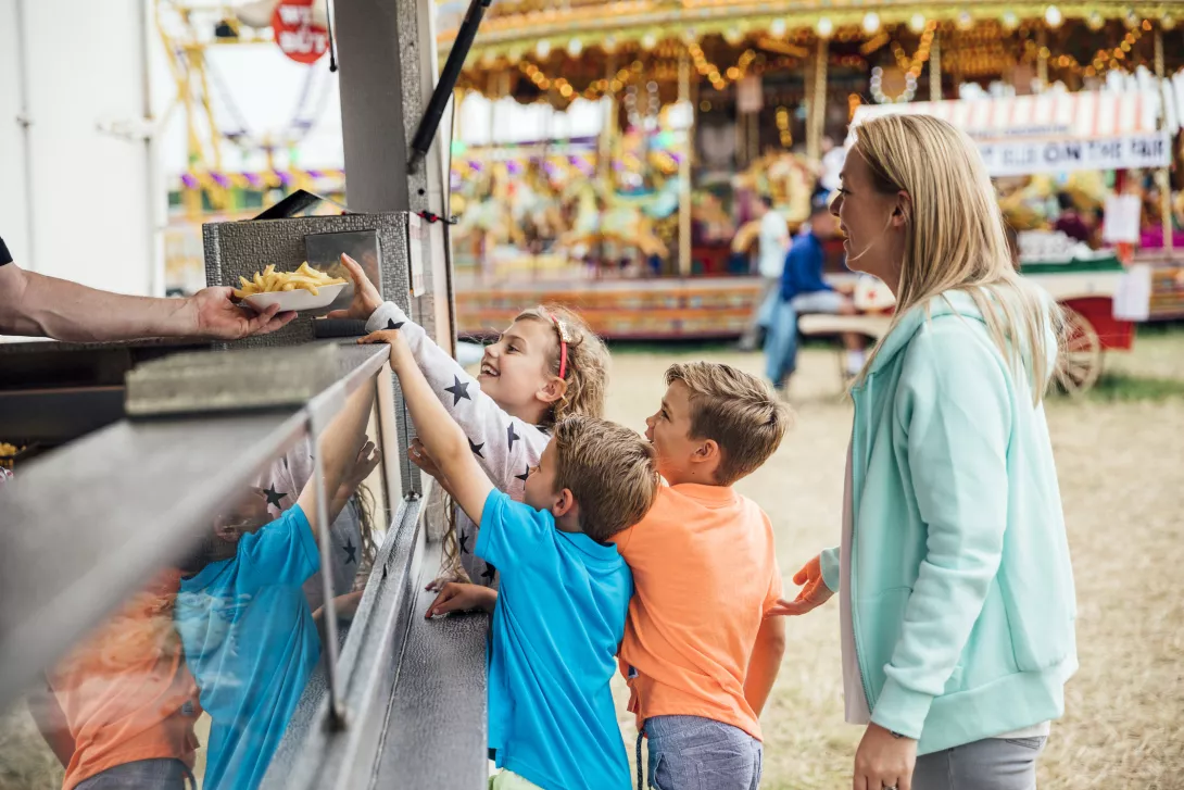 Family getting Food at the Fairground